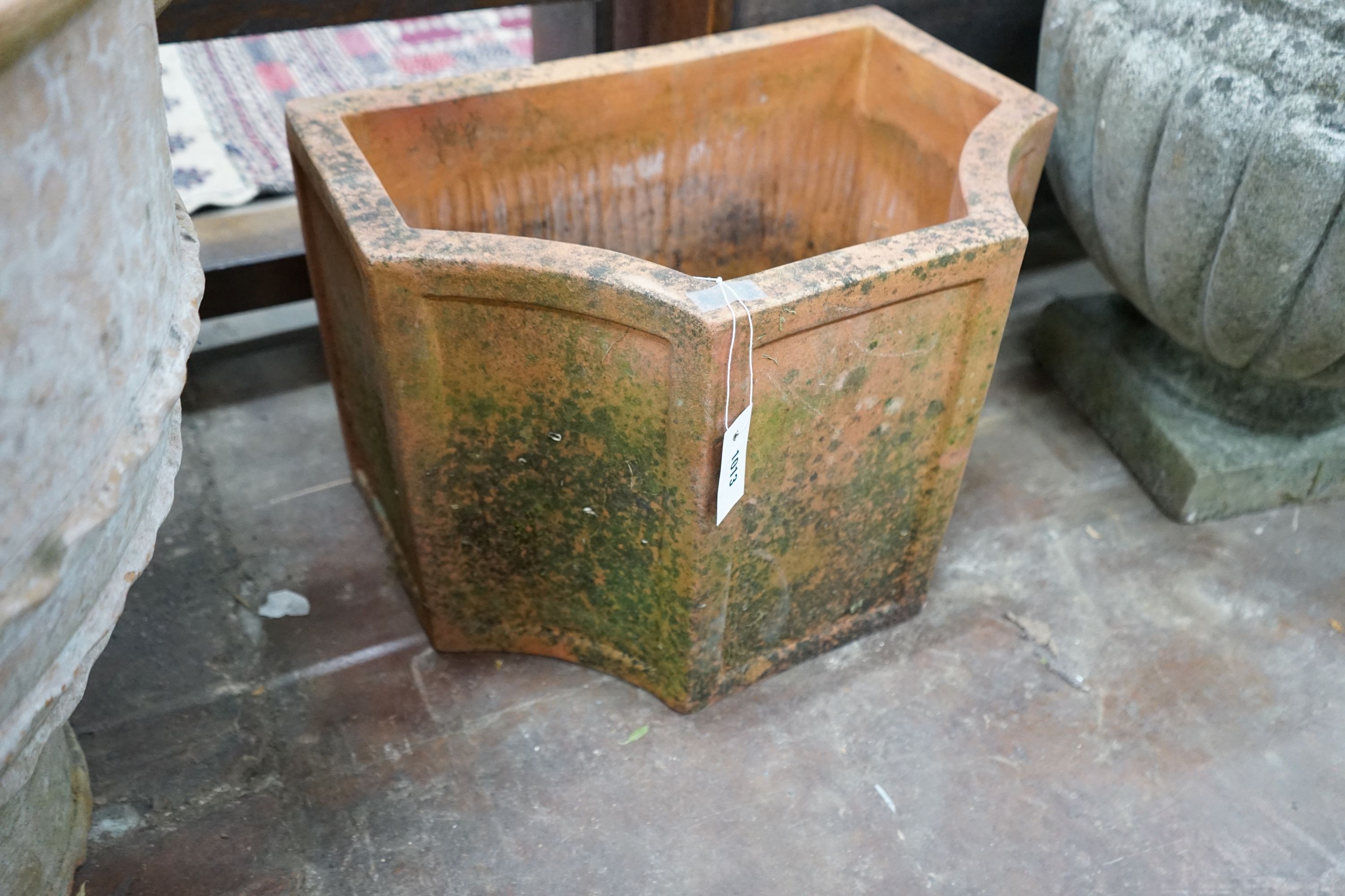 A terracotta garden planter of shaped rectangular form, width 52cm, depth 35cm, height 36cm